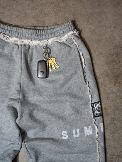 Distressed Paneled Baggy Sweatpants